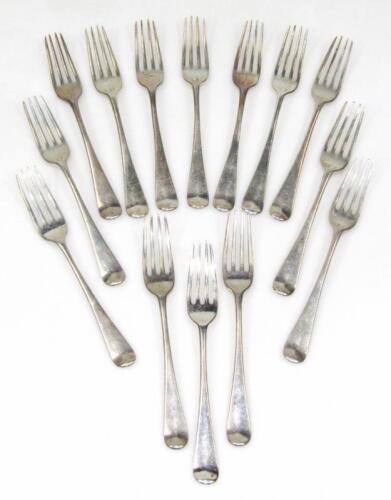 A set of 14 George III silver entrée forks