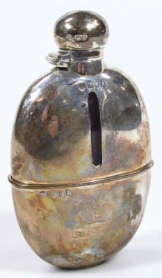 A Victorian silver and glass hip flask