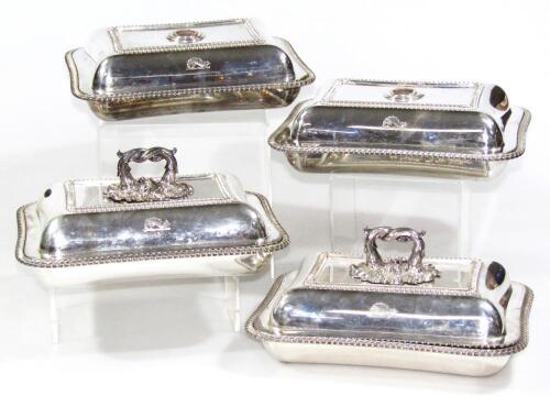 A set of four 19thC silver plated entree dishes