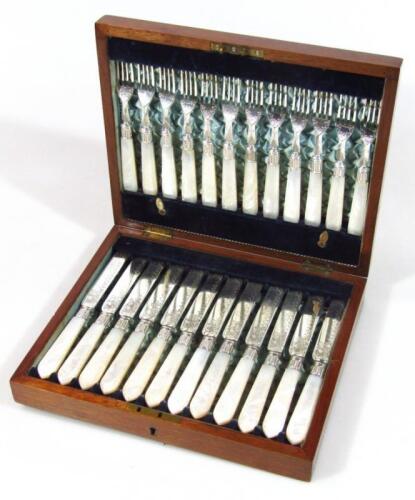 A canteen of Edwardian silver plated and mother of pearl knives and forks