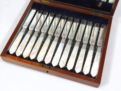 A canteen of Edwardian silver plated and mother of pearl knives and forks - 2