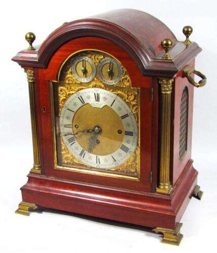 A late Victorian mahogany arched top fusee table clock