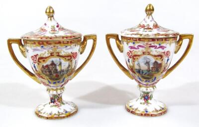 A pair of 19thC Vienna porcelain vases