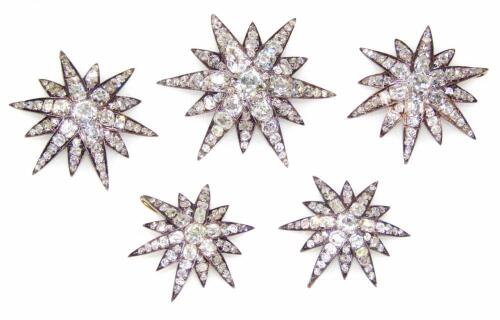 A set of five Victorian diamond set six point star emblems