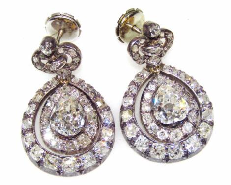 A pair of 19thC French diamond set pendant earrings