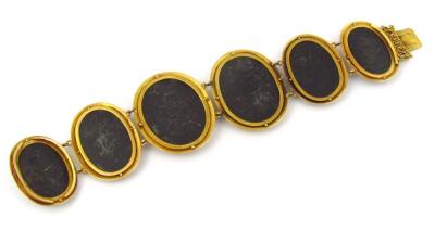 A 19thC bracelet of graduated shell cameos - 5