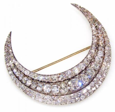 A Victorian diamond set triple crescent brooch