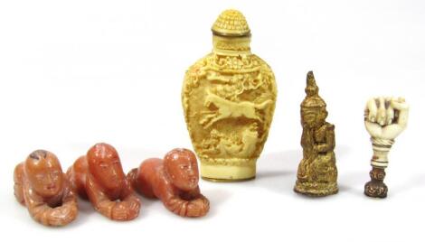 Various miniature Asian trinkets