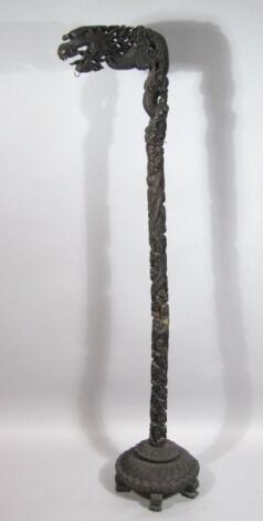 A Chinese late Qing period ebonised soft wood standard lamp