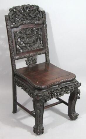 A Chinese Qing period carved chair