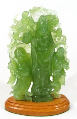 A modern carved green jade style figure group of hotei