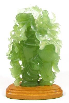 A modern carved green jade style figure group of hotei - 3