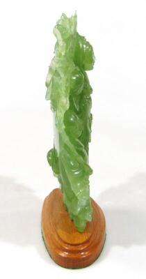 A modern carved green jade style figure group of hotei - 4