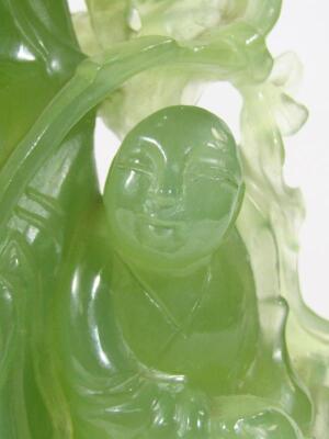 A modern carved green jade style figure group of hotei - 7