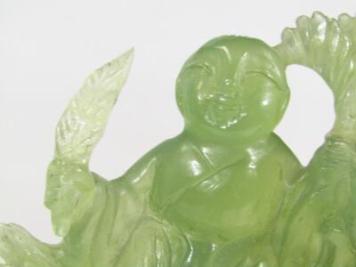 A modern carved green jade style figure group of hotei - 8