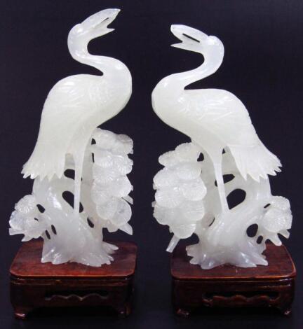 A pair of modern white jade carvings of herons