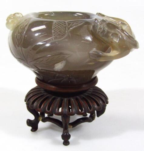 A polished Chinese brown jadeite style bowl