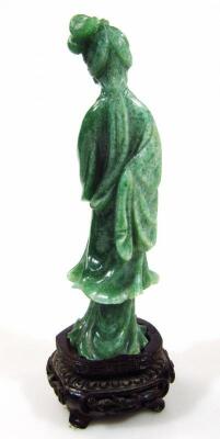 A dark green jade coloured figure of a geisha - 3