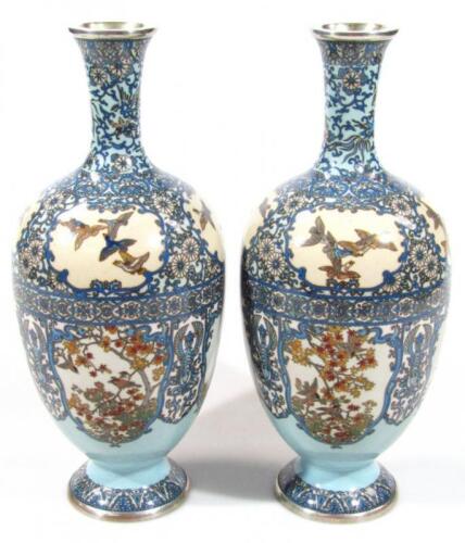 A pair of Japanese silver wire cloisonne baluster vases