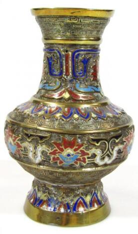 A 20thC champleve enamel and brass vase