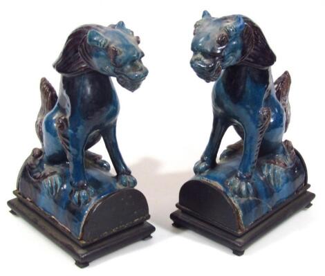 A pair Chinese turquoise ground pottery ridge tiles