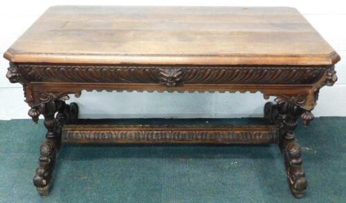 A Victorian carved oak side table