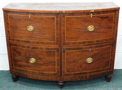 A George III mahogany and satinwood banded bow fronted chest