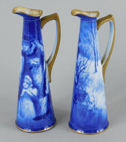 A pair of Royal Doulton Flow Blue ewers