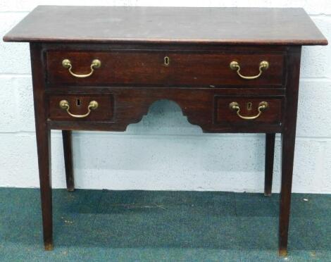 A George II oak and mahogany banded lowboy