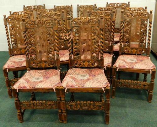 A set of fourteen Victorian oak dining chairs