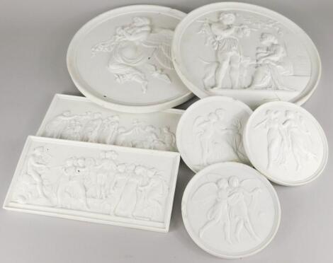 A collection of late 19th/early 20thC Continental bisque porcelain plaques