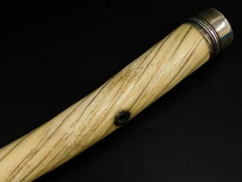 A 19thC narwhal tusk walking cane