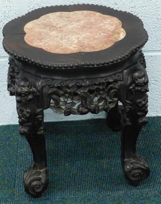 A late 19thC Chinese hardwood urn stand