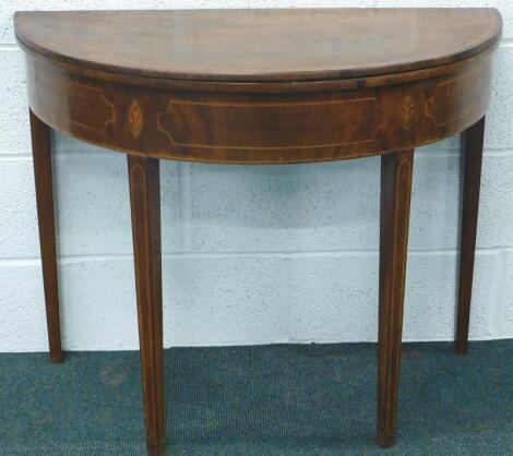 A George III mahogany demi-lune tea table