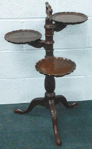 An early 20thC mahogany cake stand