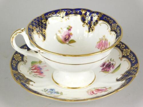 A 19thC Staffordshire cup and saucer