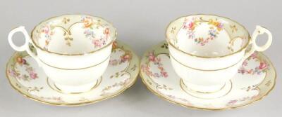 A pair of 19thC Ridgeway porcelain cups and saucer