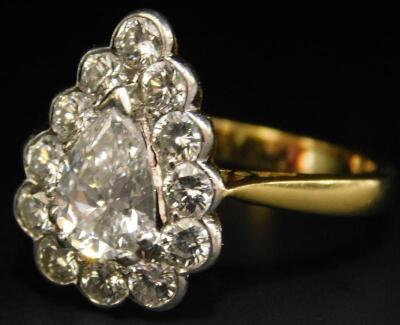 An 18ct gold pear cut diamond ring