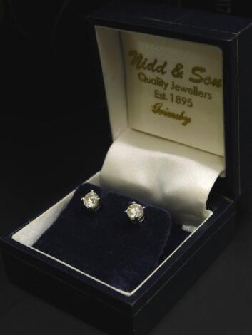 A pair of 18ct white gold diamond stud earrings