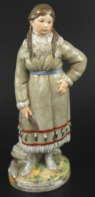 A 19thC Russian porcelain figure of a Kamchatka woman