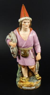 A 19thC Russian porcelain figure of a Laplander