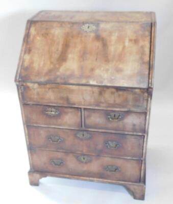 A George II style walnut bureau