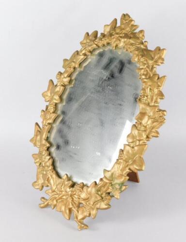 A late 19thC cast iron dressing mirror