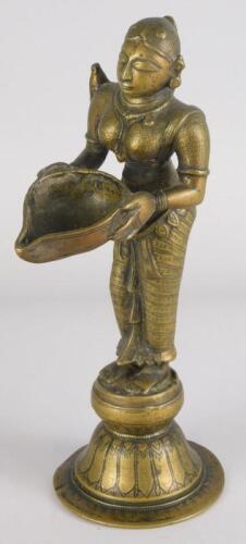 A Tibetan style bronze female figure