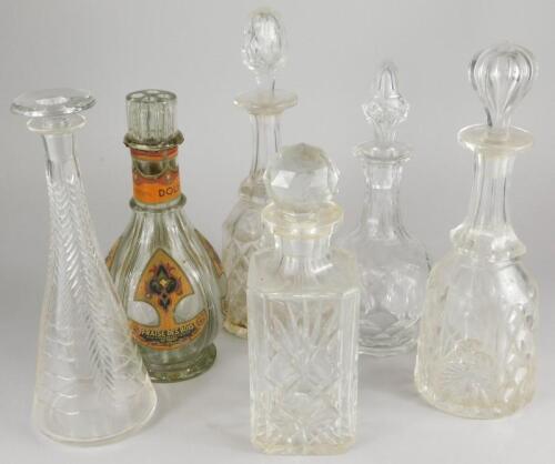 A collection of decanters and stoppers