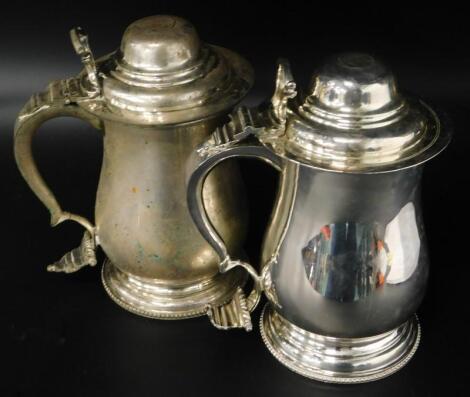 A pair of 18thC design baluster shaped tankards