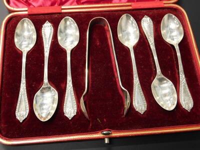 A cased set of six silver teaspoons and matching sugar tongs