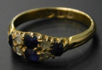 An 18ct gold sapphire and diamond dress ring