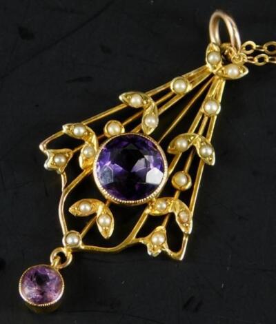 An Art Nouveau pendant and chain