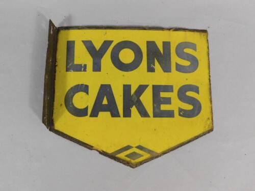 A Lyons Cakes blue and yellow pennant shaped enamel advertising sign